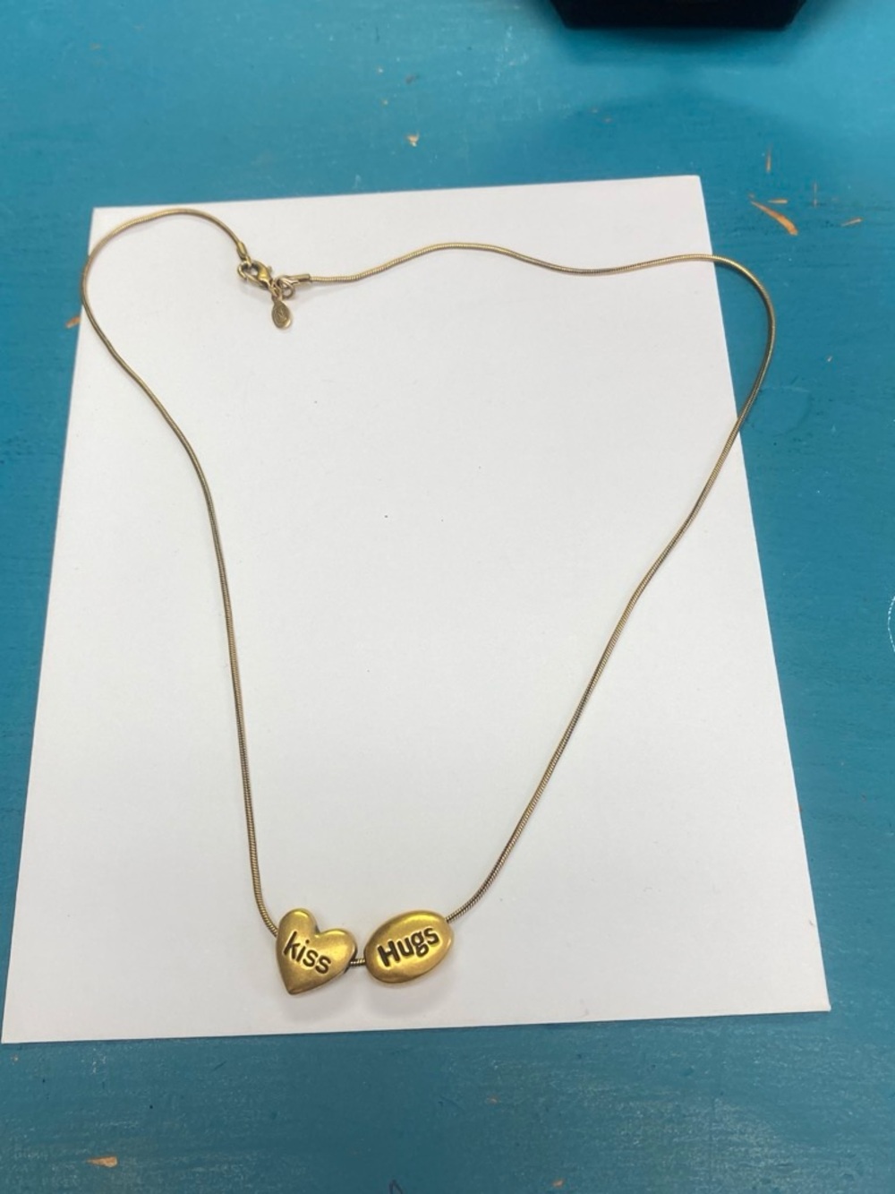 Vintage Napier Gold tone Kiss & Hugs' Heart Pendant Necklace